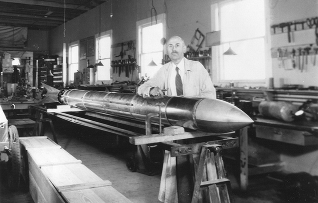 Robert Goddard with one of his later rockets in his workshop at Roswell, New Mexico, in October 1935 (NASA)